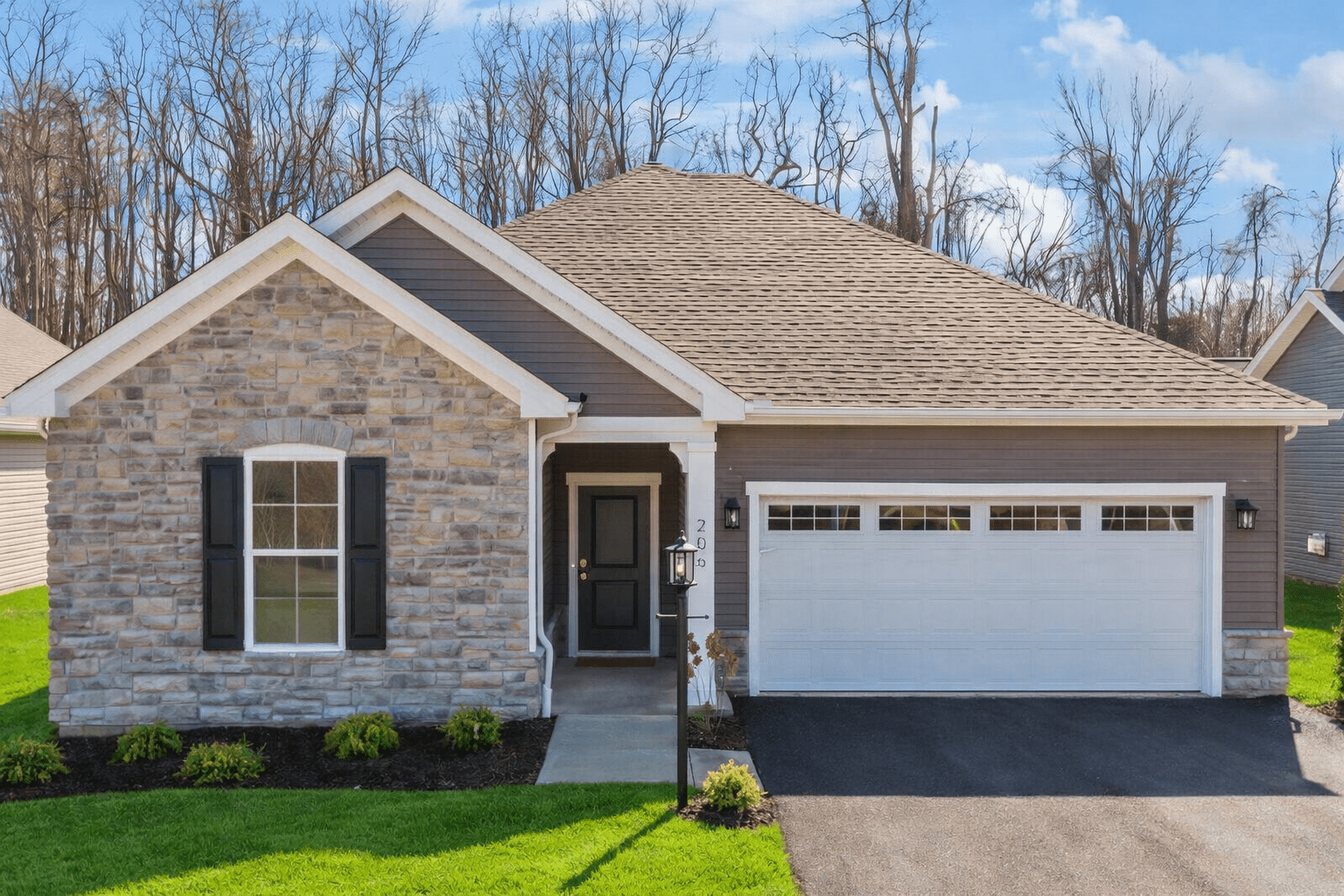 Suburban Home With Lush Green Lawn